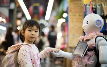 photo of girl laying left hand on white digital robot